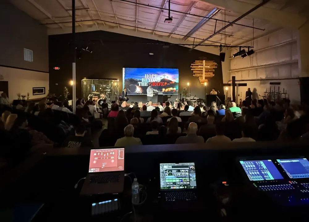 Full room during a weekend service, seen from the production booth